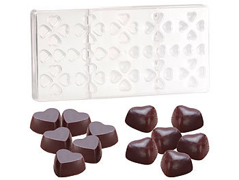 Gießen von Schokolade in Form von Herz Schokobrunnen selbstgemachtes Gastgeschenk