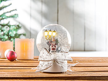 ber/ührungsaktiv Schneekugeln infactory Glaskugel: Schneekugel mit singendem Weihnachtsmann LED-Laterne