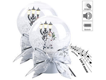 Schneekugel: infactory 2er-Set Schneekugeln mit singendem Weihnachtsmann, LED-Laterne